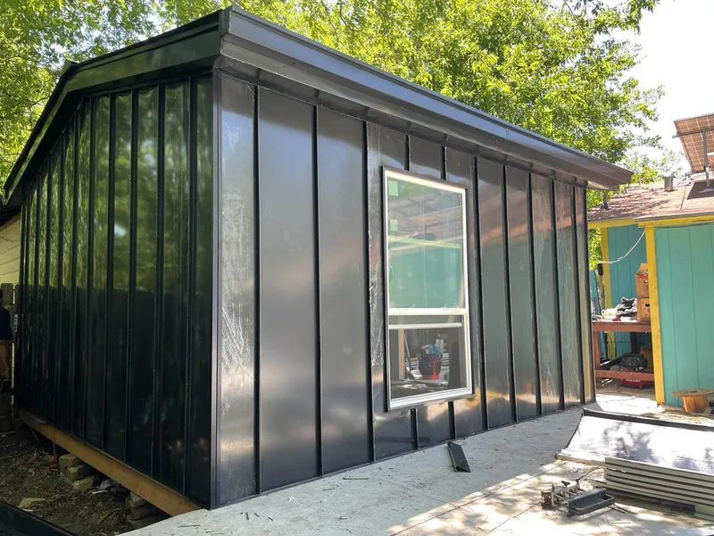 Black standing seam metal wall panels for Metal Roof Installation in Rolla